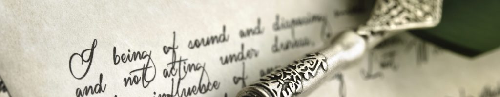 Last Will and Testament document with quill pen and handwriting